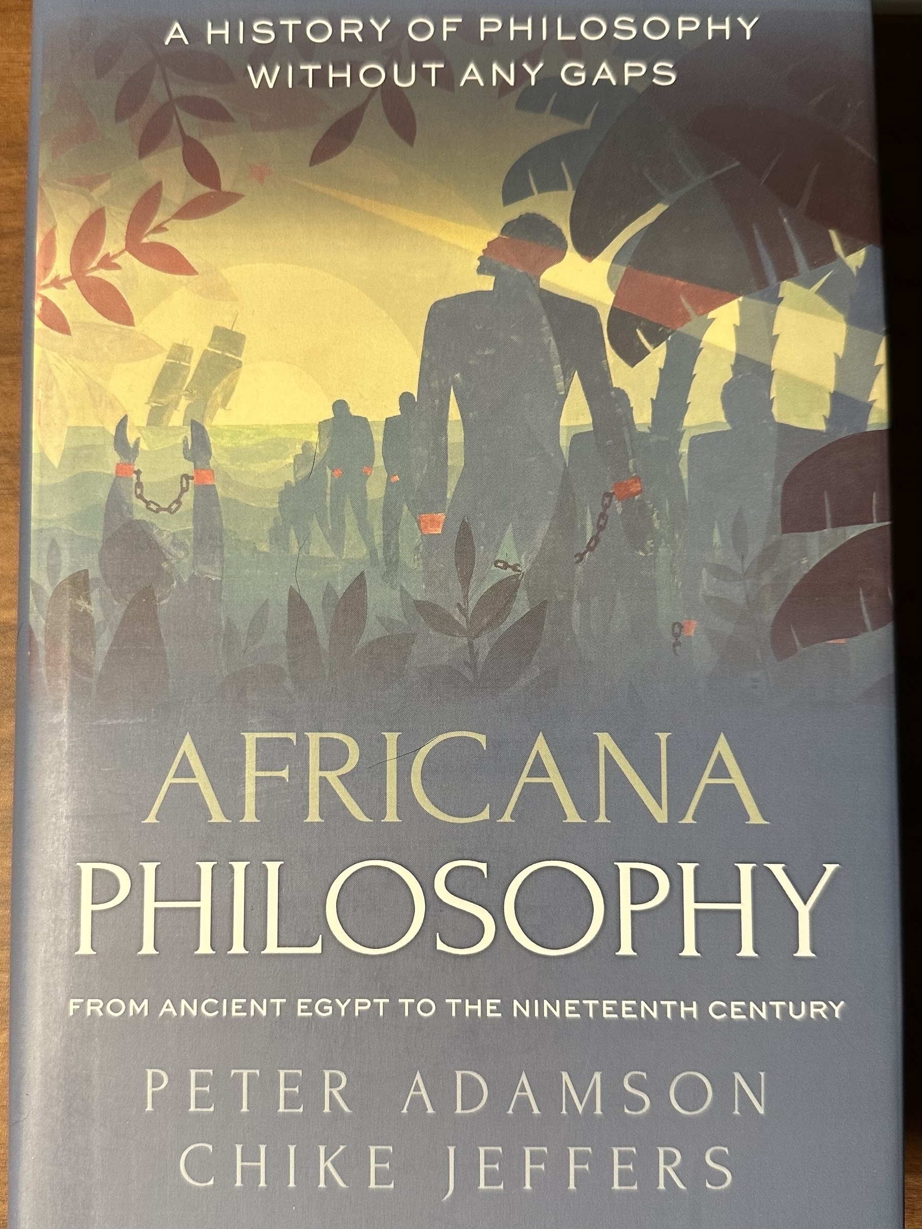 A book cover titled "Africana Philosophy" by Peter Adamson and Chike Jeffers features an abstract illustration of people and plants, accompanied by the tagline "A History of Philosophy Without Any Gaps."