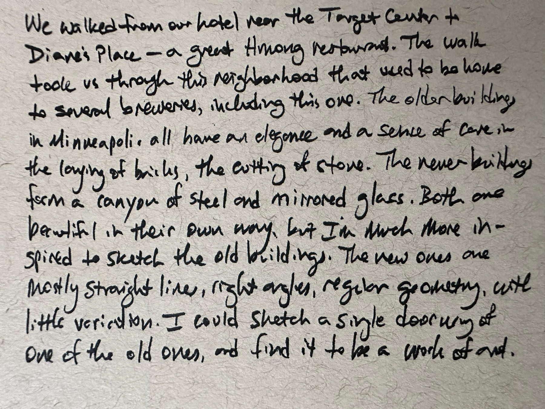 A handwritten note describes a walk from a hotel near the Target Center to a Hmong restaurant called Diane’s Place, passing through a neighborhood once home to several breweries, reflecting on the old and new buildings of Minneapolis and the writer's preference for sketching the older ones.