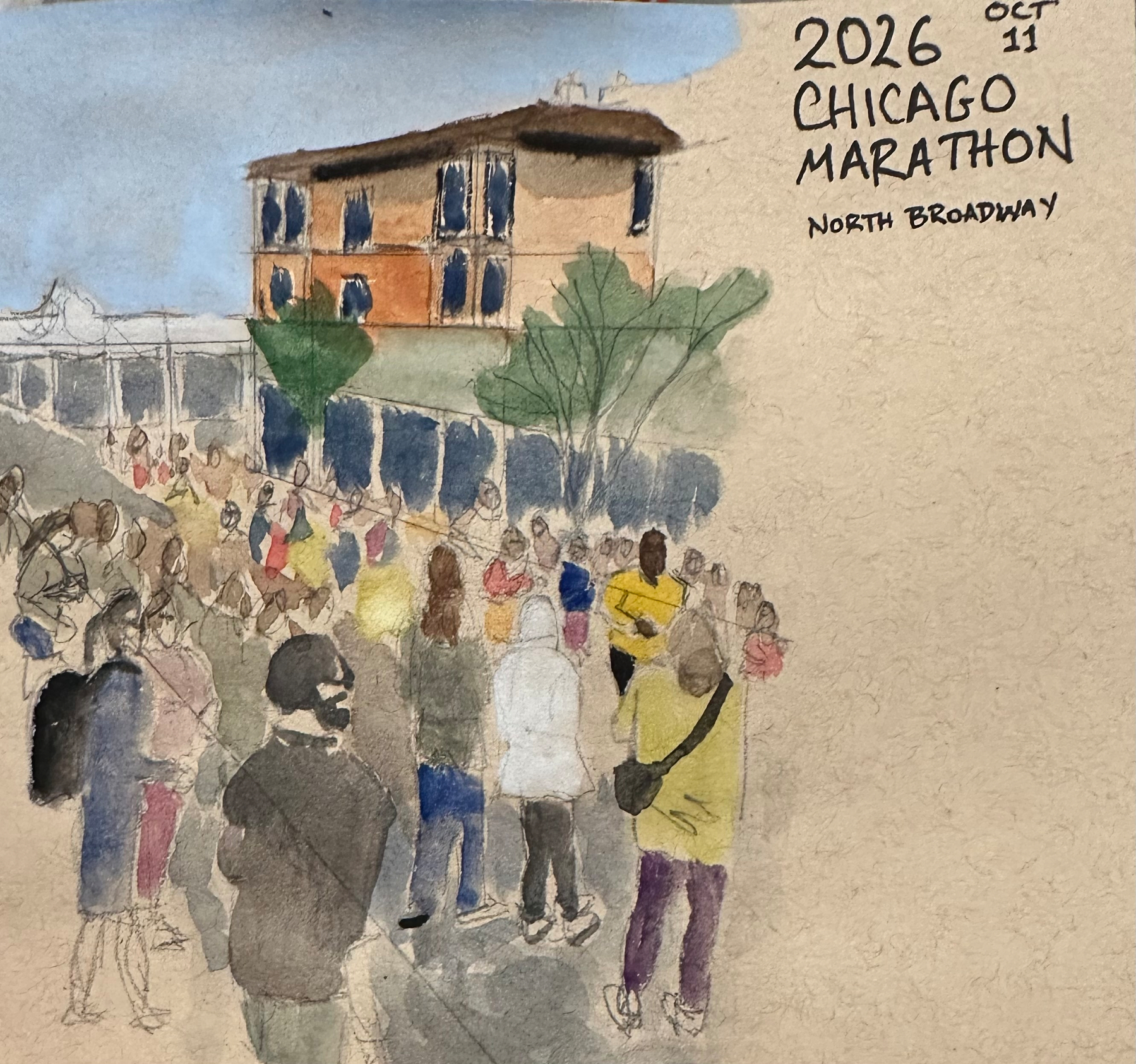 A crowd of people gathers near a building on North Broadway for the 2026 Chicago Marathon on October 11.